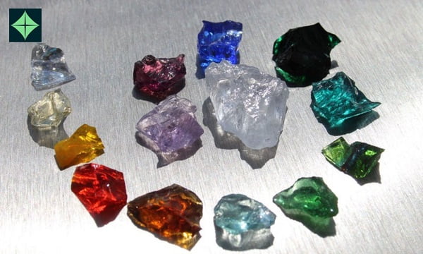 Different kinds of Andara crystals kept on the floor