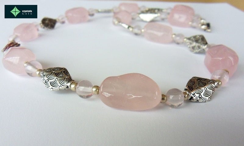 rose quartz bracelet on the white background