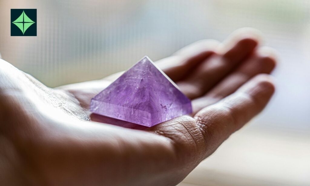 amethyst crystal in the hand